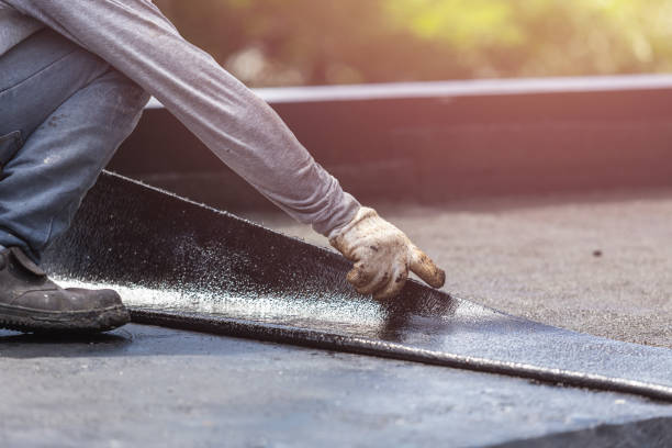 Professional Exterior Waterproofing technician working in Springfield, OH
